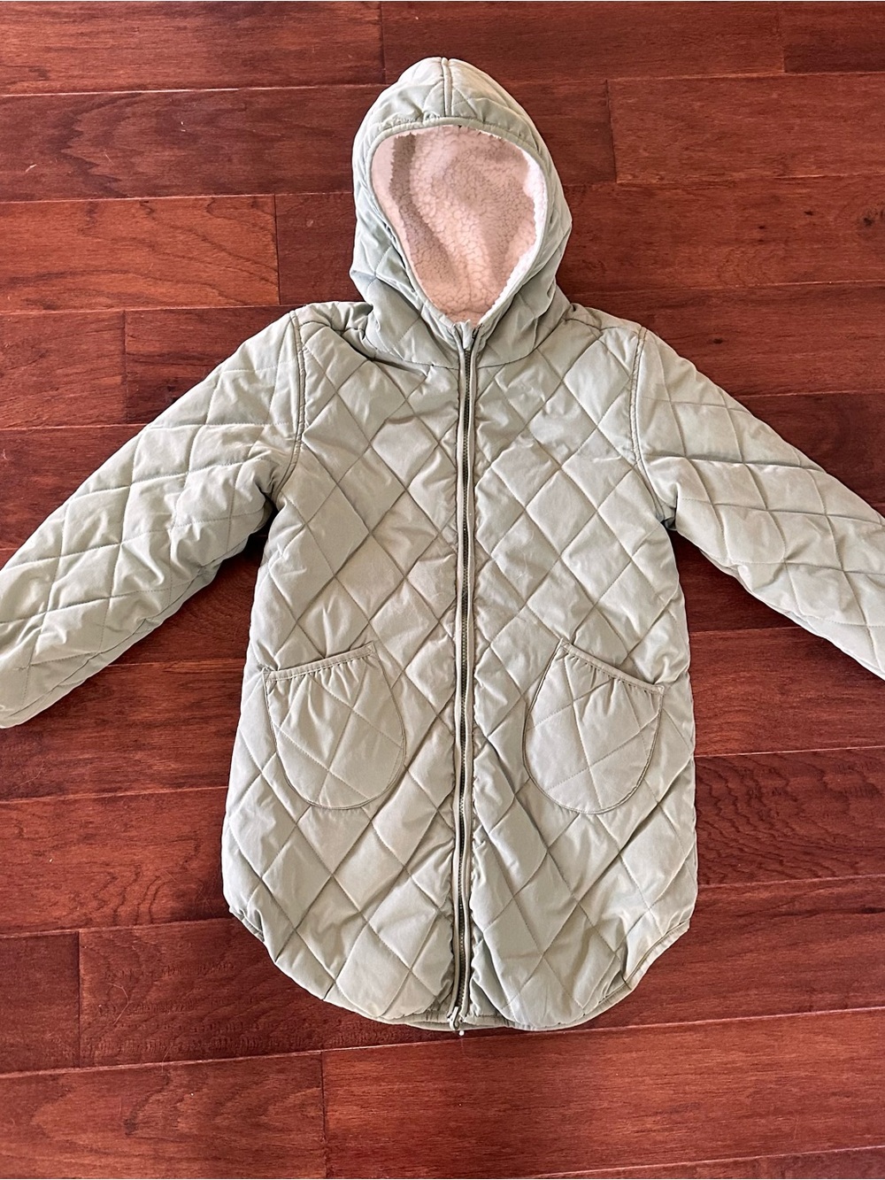 Girl’s reversible olive green winter coat with Sherpa.